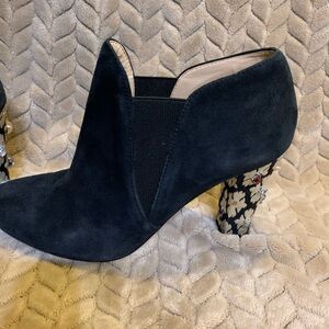 Chic Black Suede Heeled Boots with Floral Accent